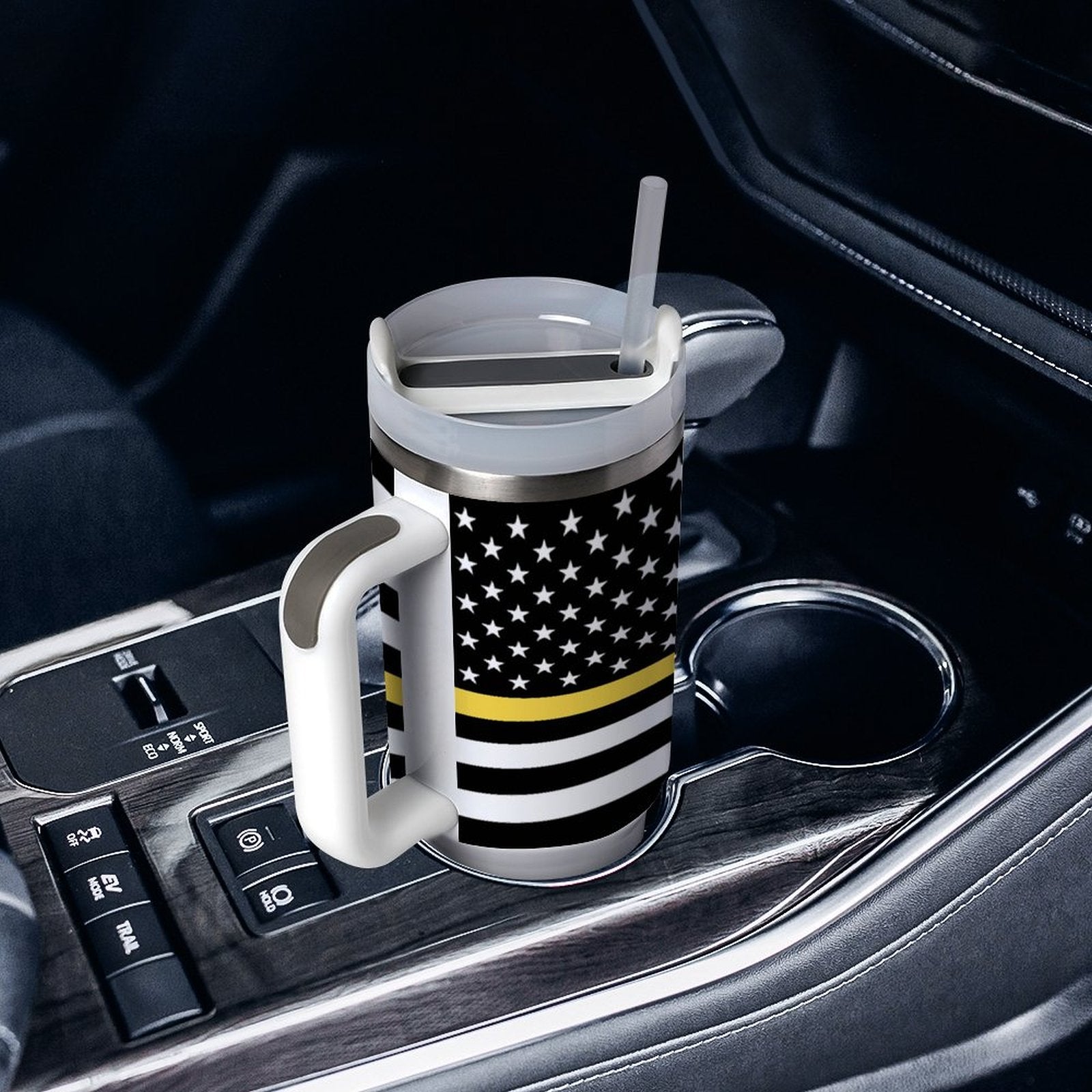 [Brand] mug with flag design in car cup holder.