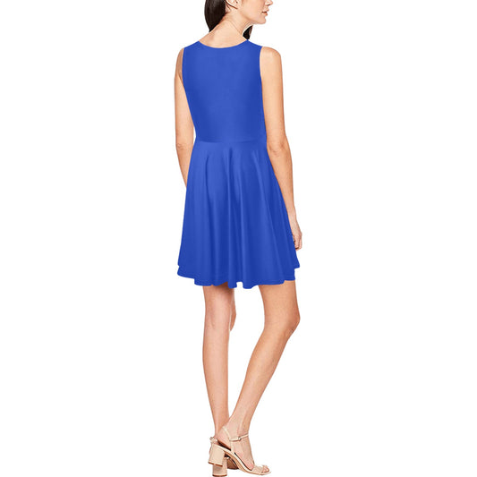 Woman wearing [Brand] blue sleeveless dress and nude heels.