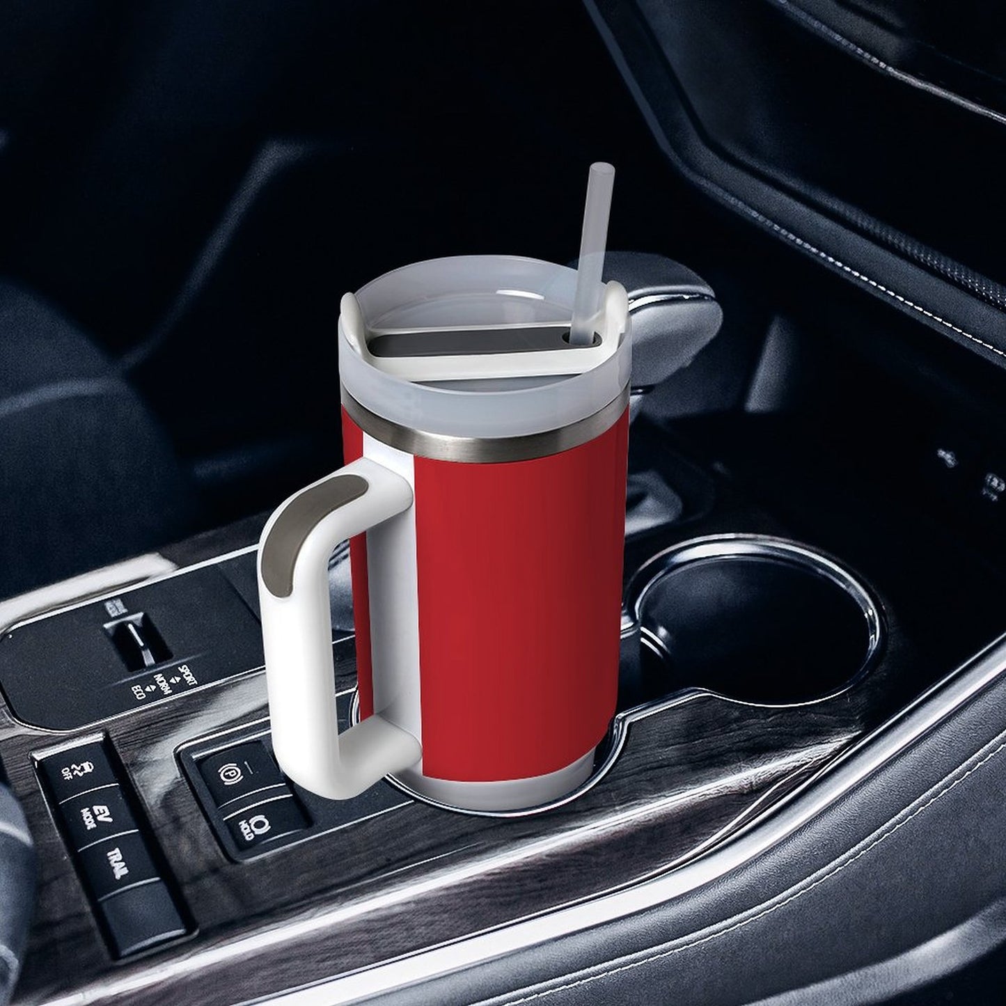 Red [Brand] mug with handle in car cup holder.