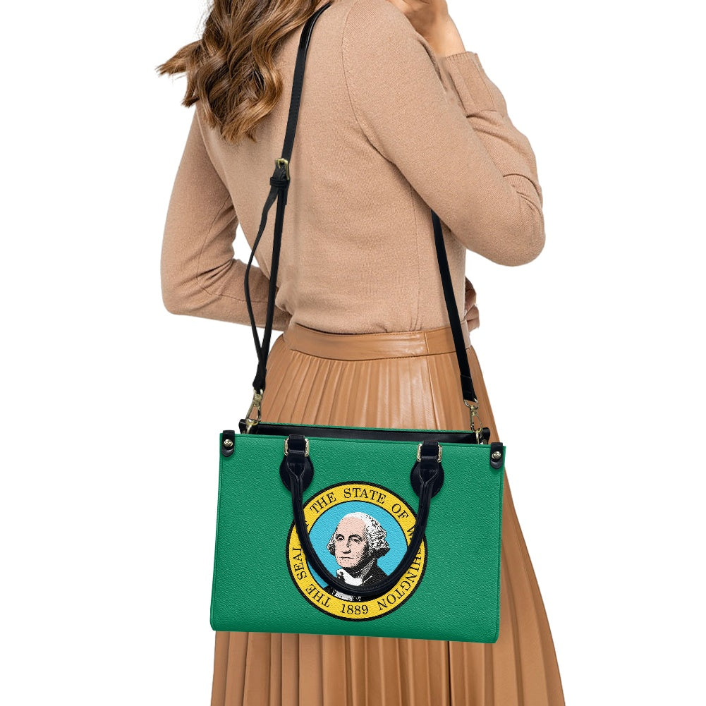 Woman carrying [Brand] bag with Washington State design.