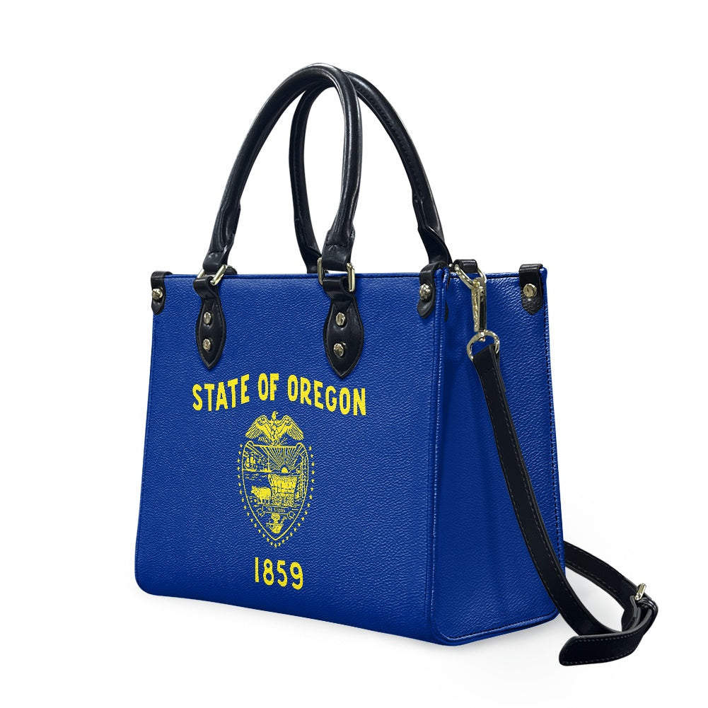 Blue handbag with State of Oregon design, [Brand].