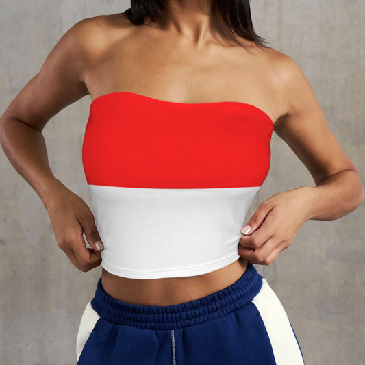 Woman wearing [Brand] red and white strapless top, blue pants.