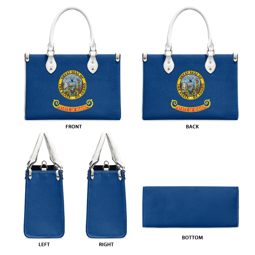 Blue [Brand] handbag with Idaho state seal and handles.