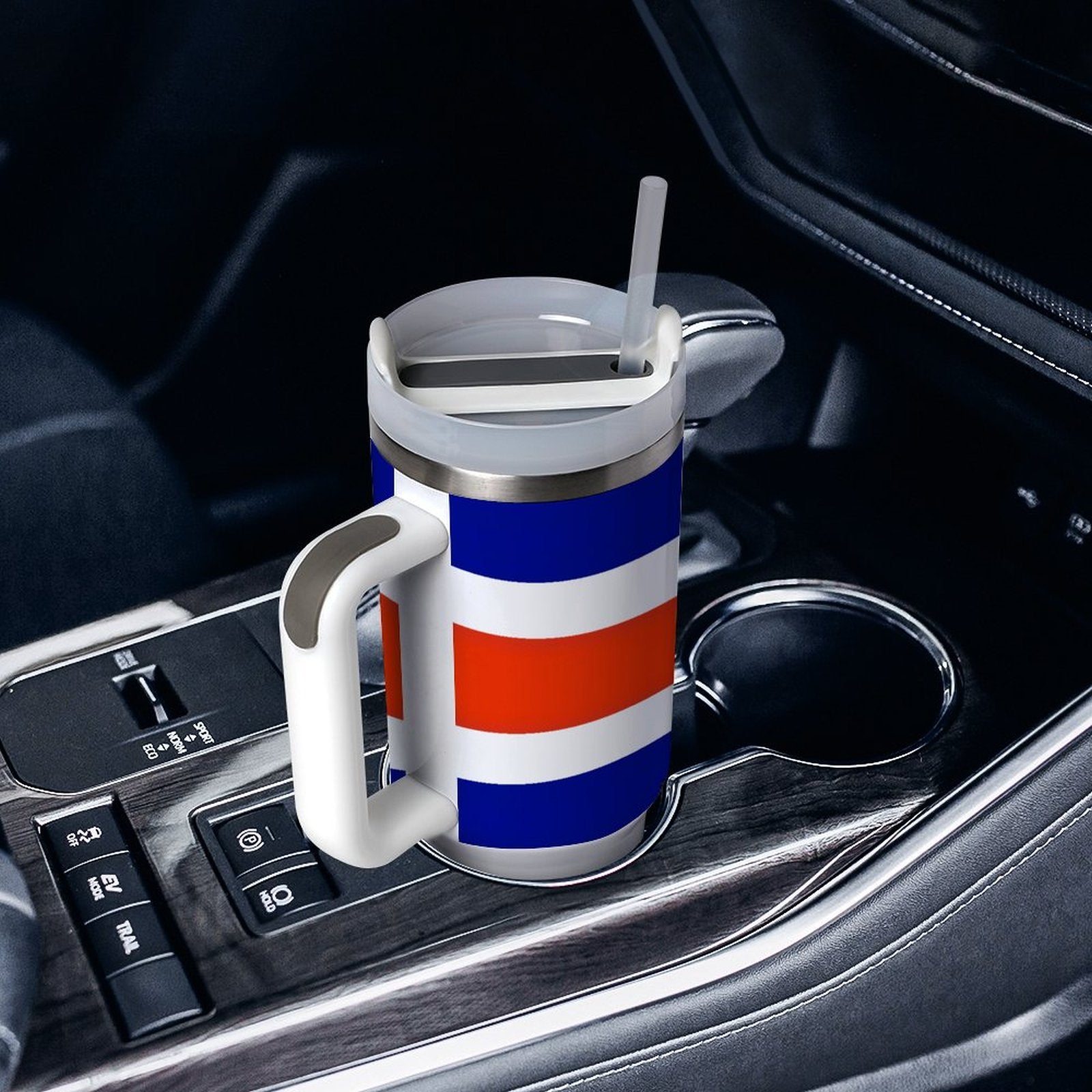 [Brand] colorful travel mug with handle, fitting car cupholder.