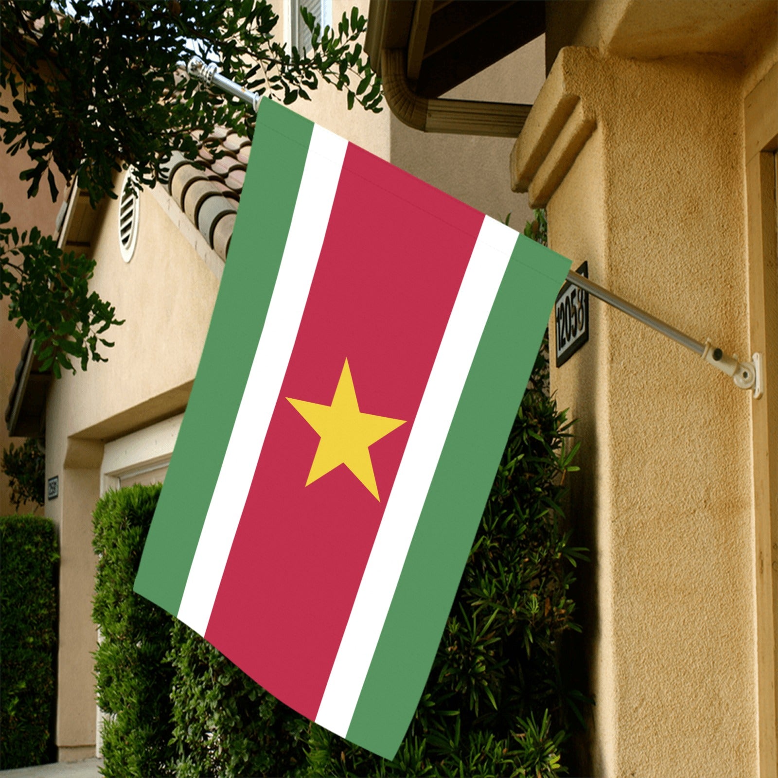 [Luv My Flag] Suriname flag displayed outside a house.