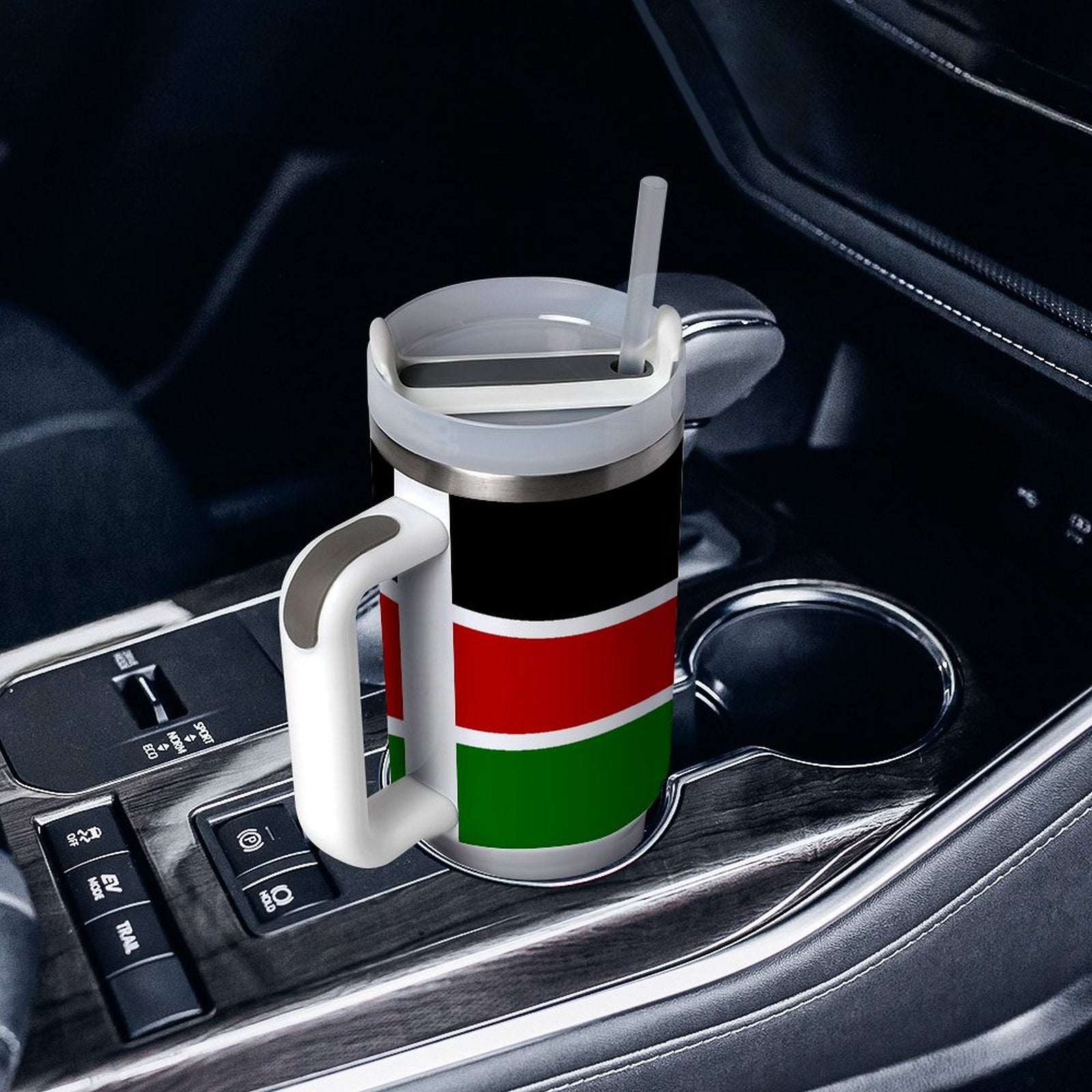 [Brand] insulated travel mug with straw in car cup holder.