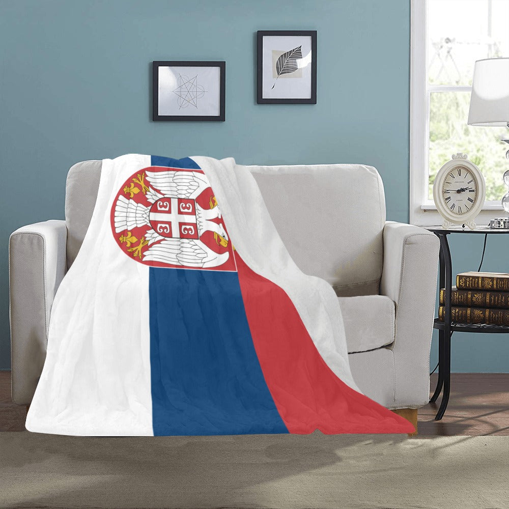 Cozy sofa draped with Luv My Flag Serbian blanket.