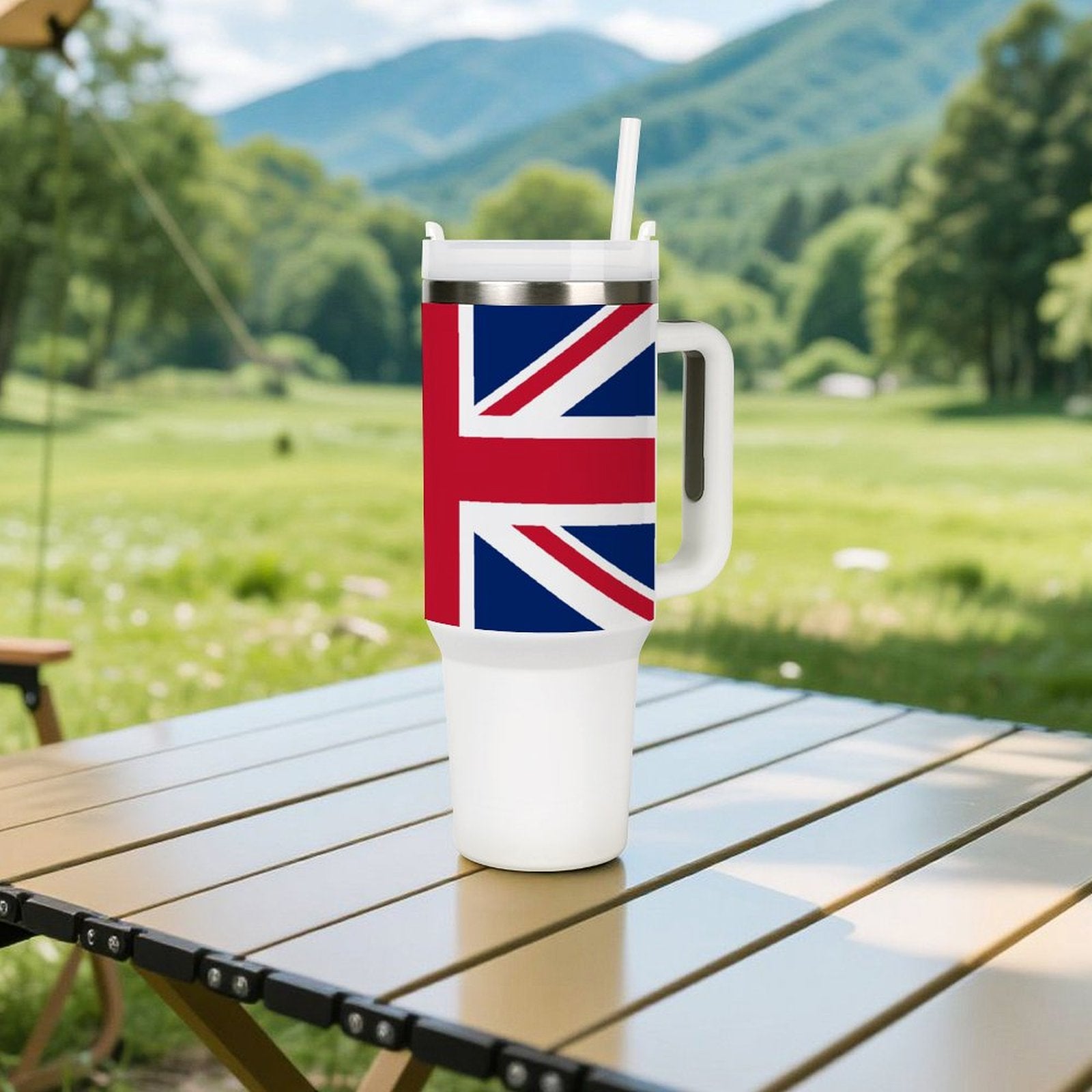 [Brand] tumbler with Union Jack design on picnic table.
