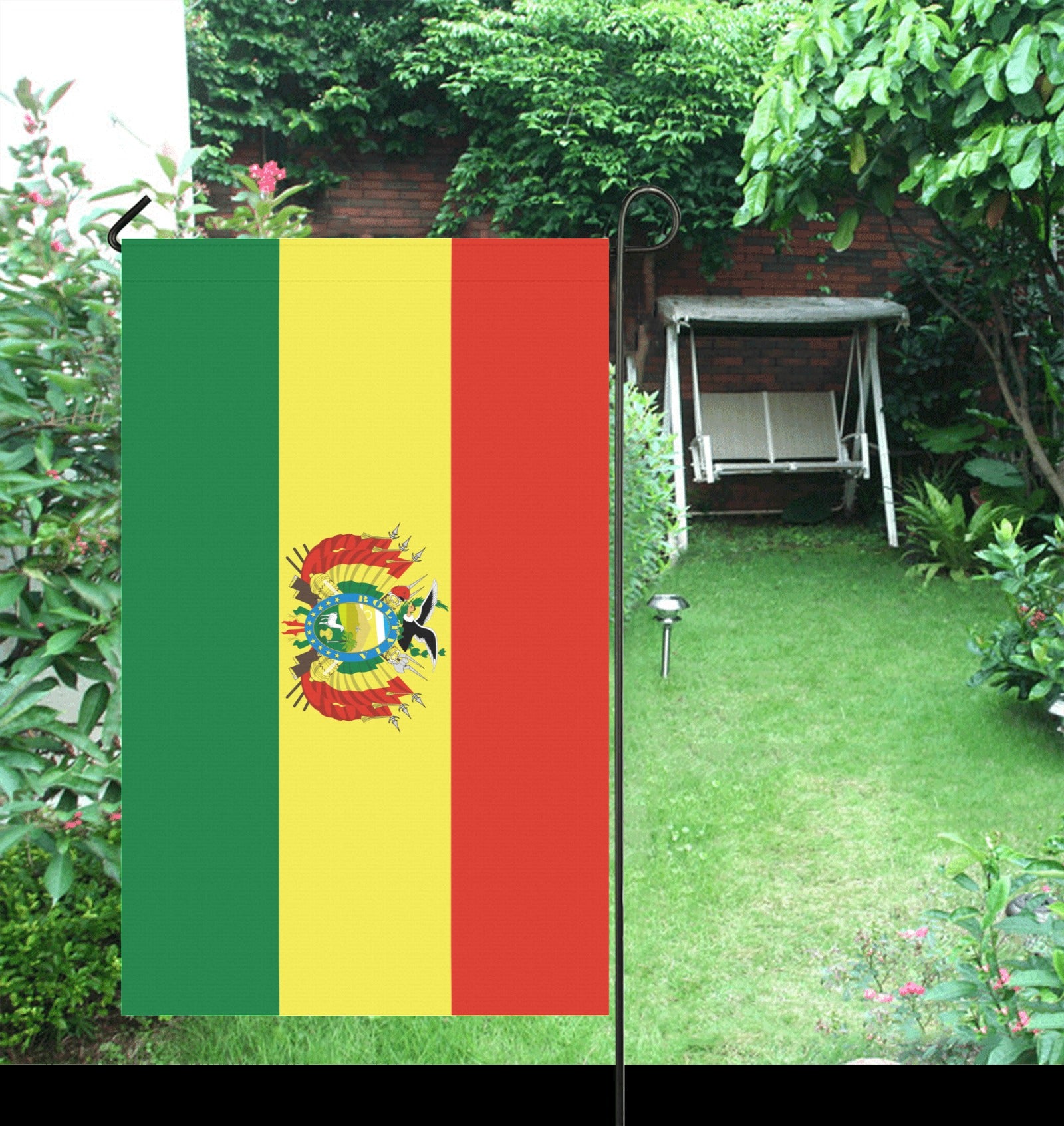 Luv My Flag: Bolivian flag displayed in a garden.