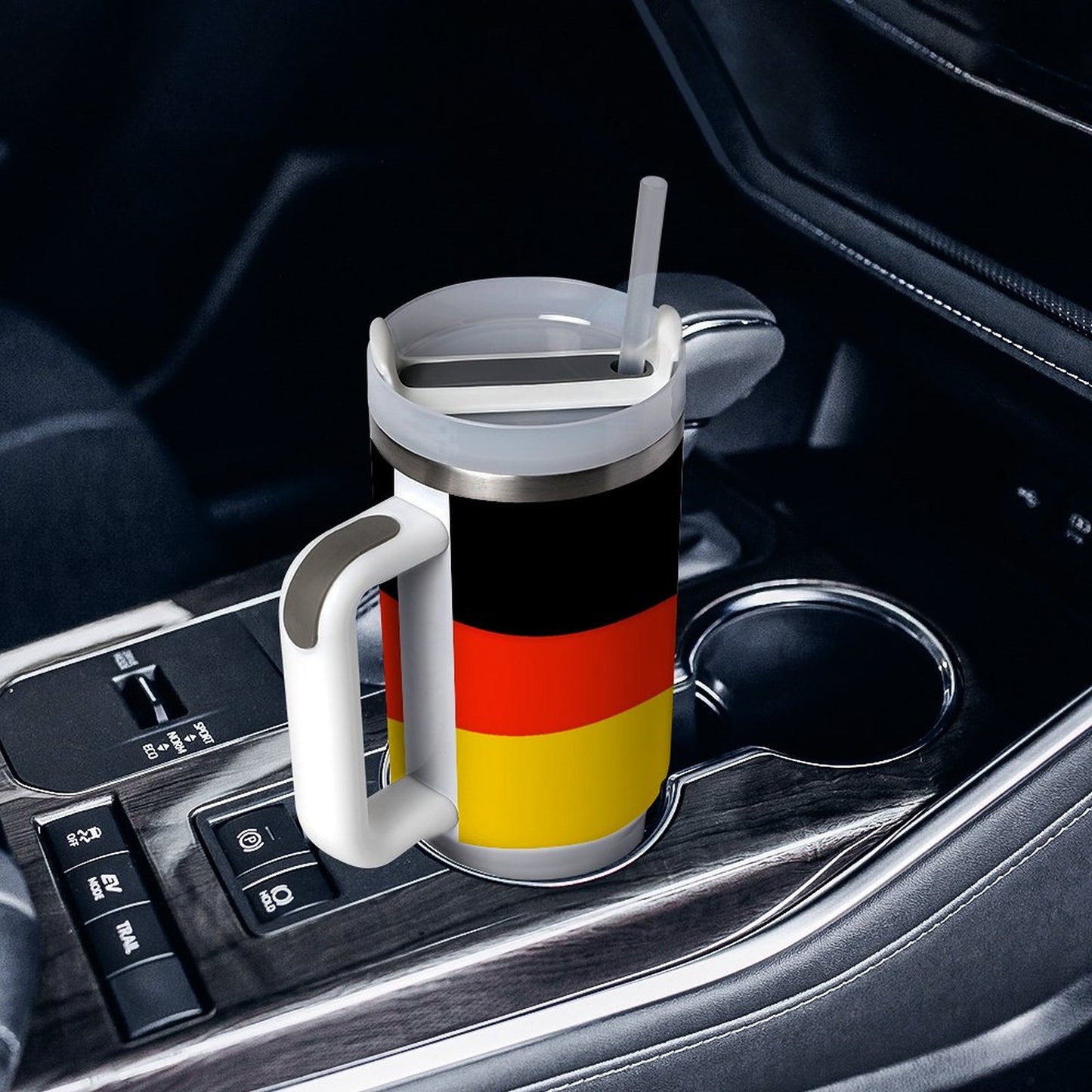 [Brand] travel mug with German flag in car holder.