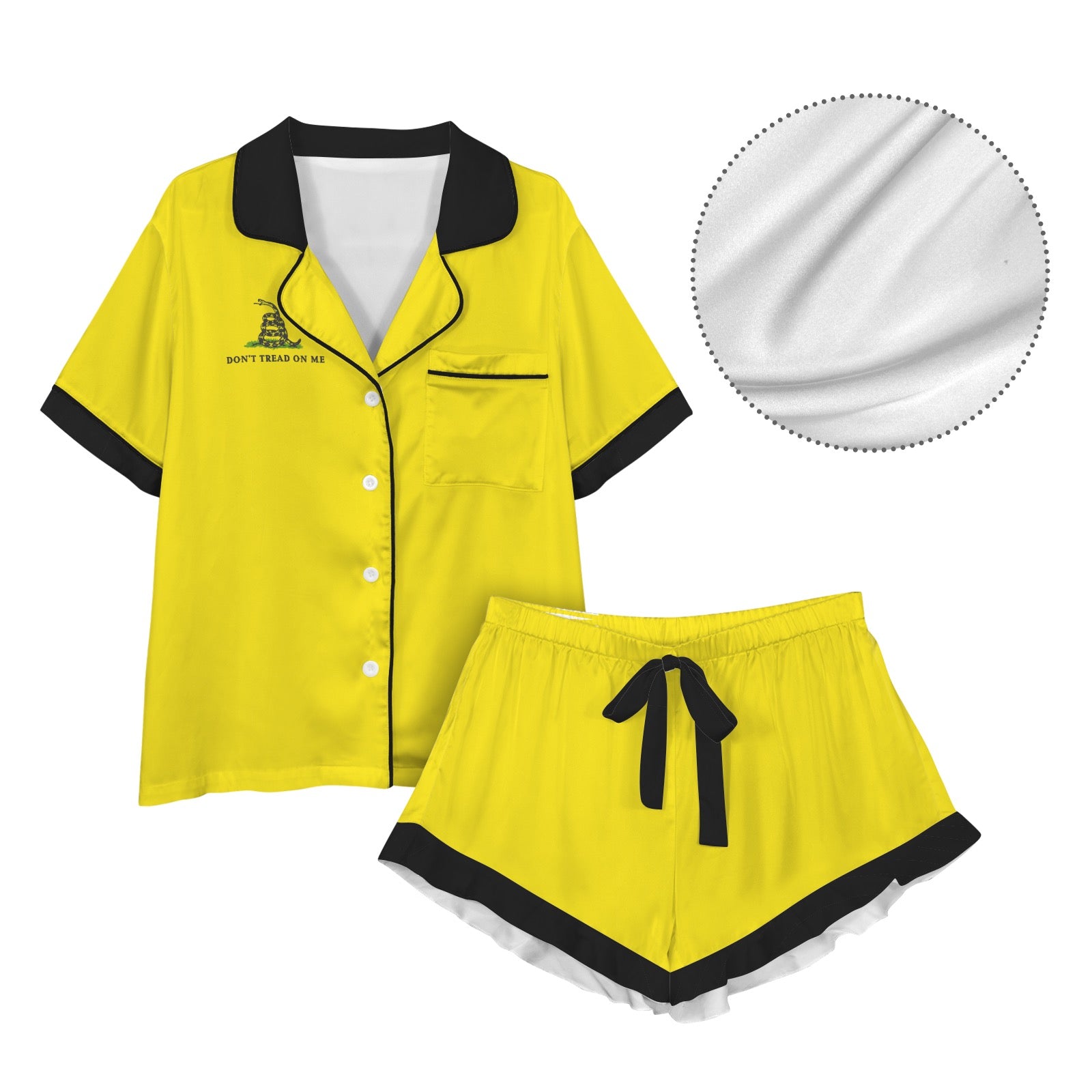 [Brand] yellow pajamas with black trim and illustrated detail.