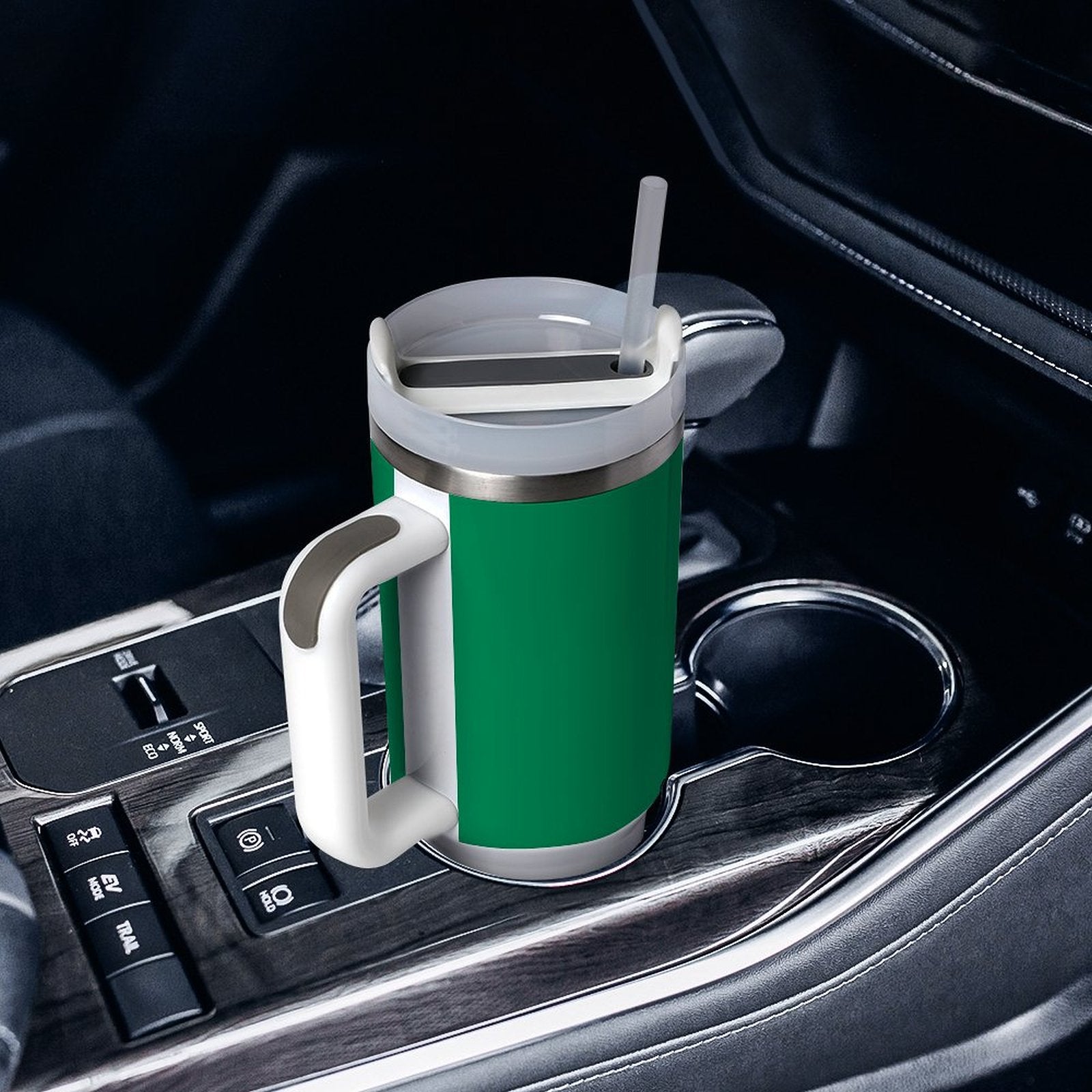 [Brand] travel mug in car cup holder, featuring handle, straw.