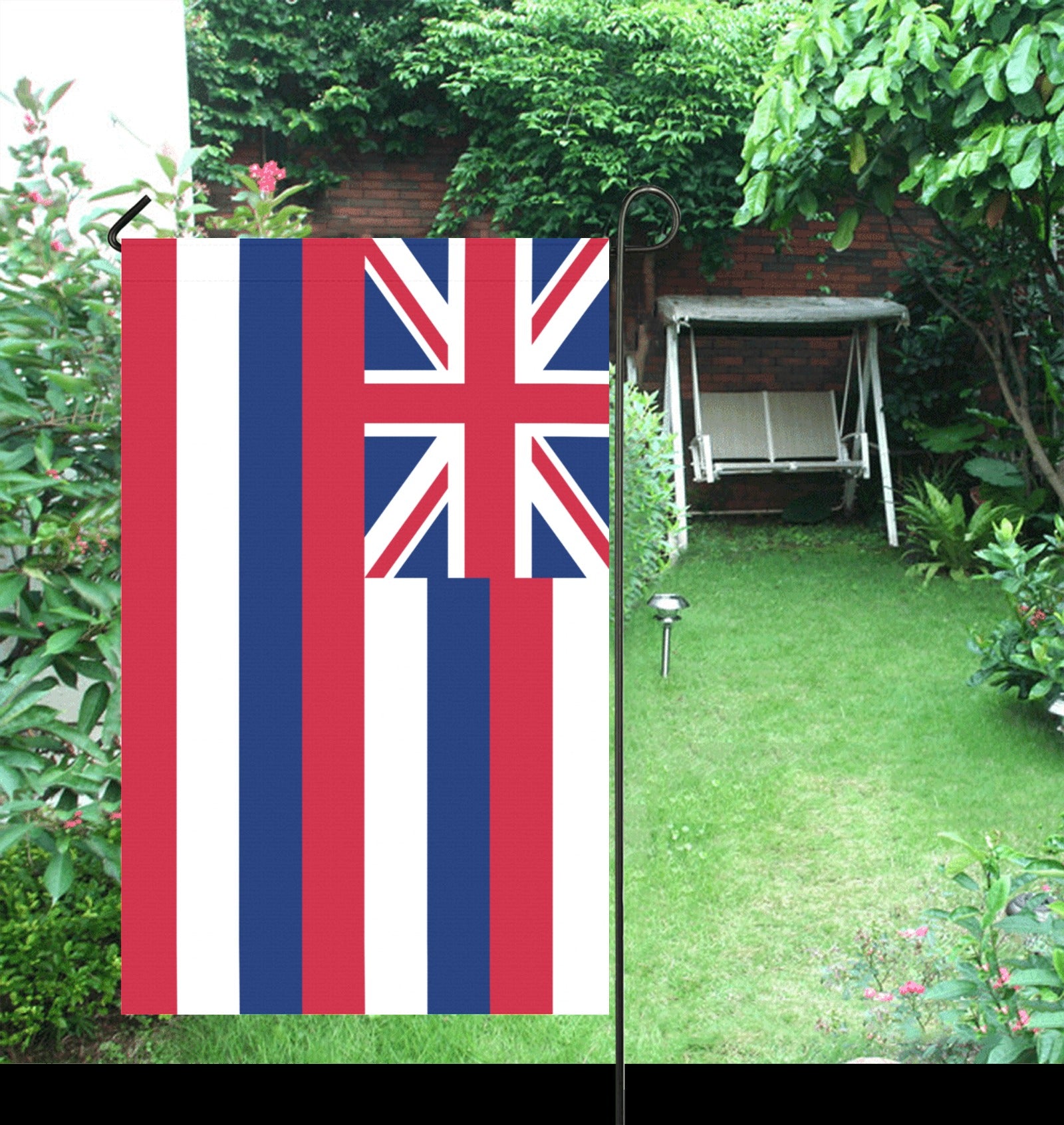 Garden with [Luv My Flag] colorful flag displayed prominently.