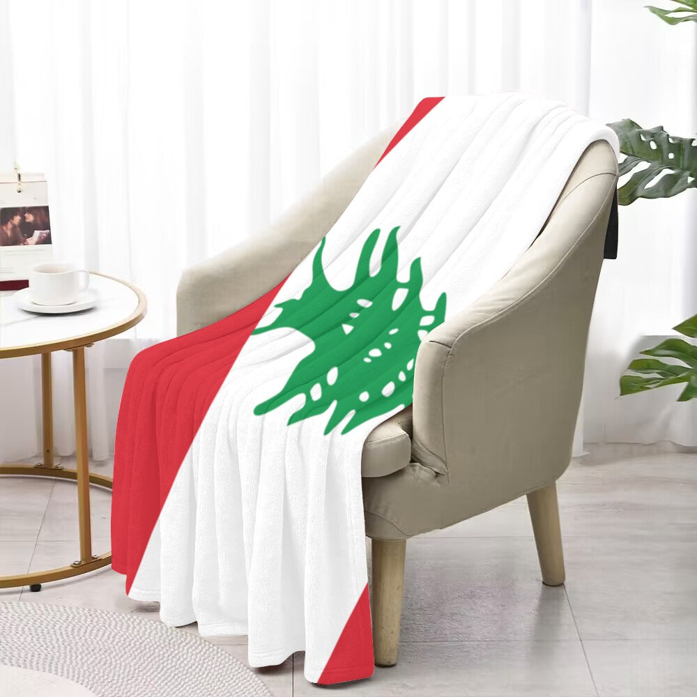 Luv My Flag Lebanon-themed blanket draped over beige chair.
