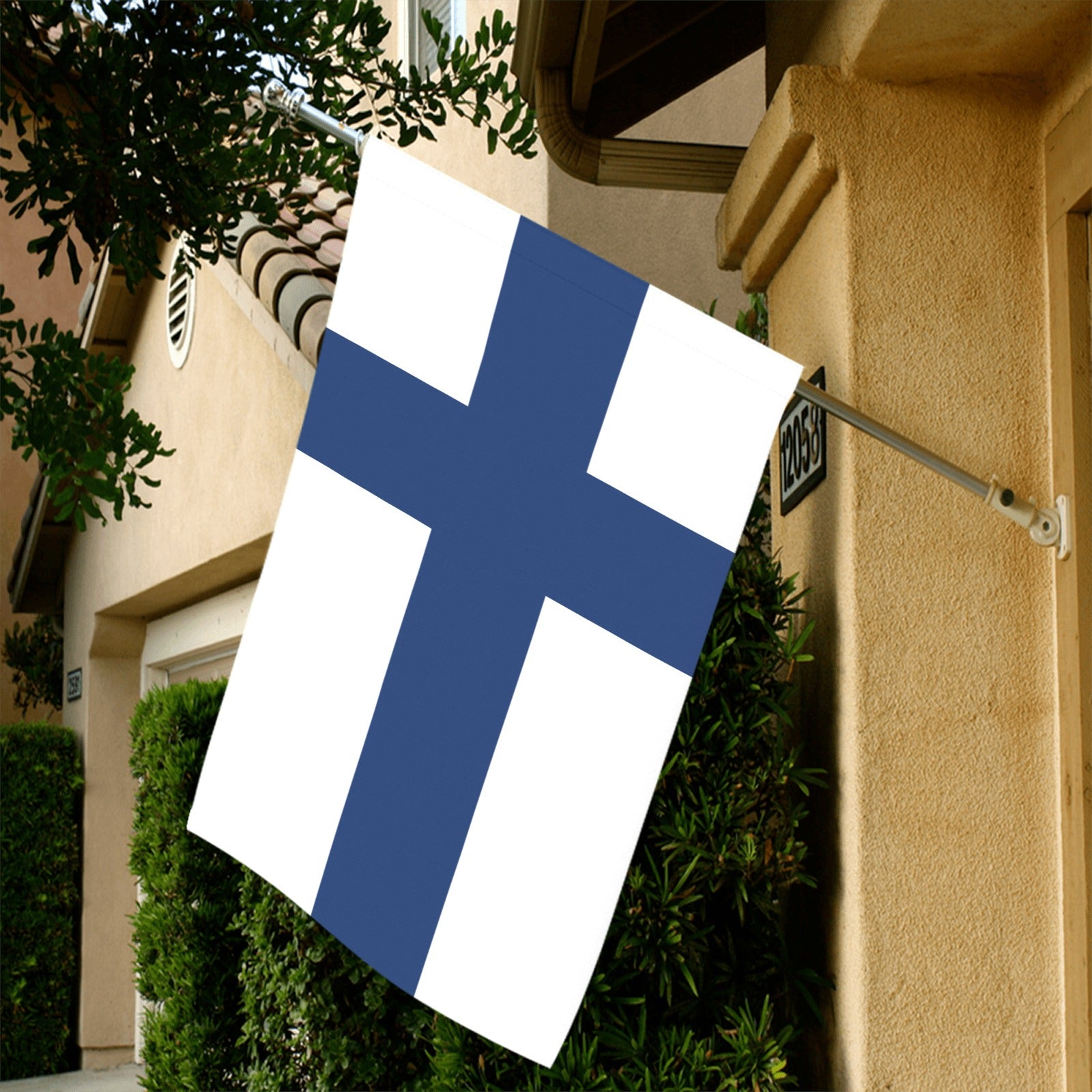 Luv My Flag Finland flag hanging outside a house.