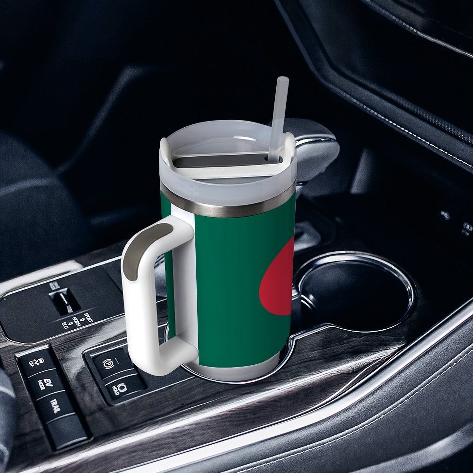 [Brand] travel mug with a straw in car holder.