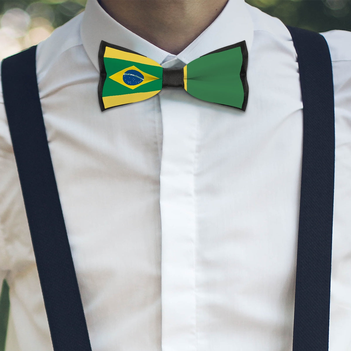 Man wearing [Brand] bow tie with Brazilian flag design.