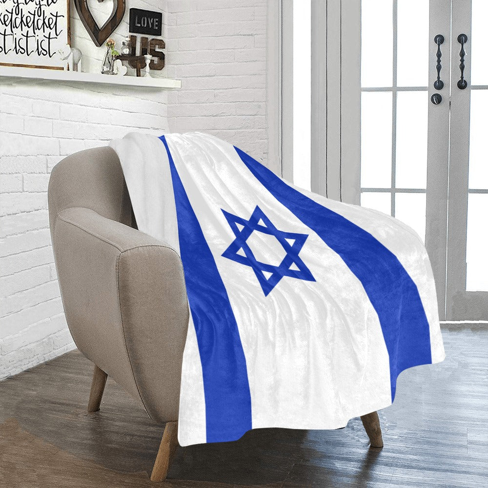 [Luv My Flag] blanket featuring Israeli flag draped on chair.