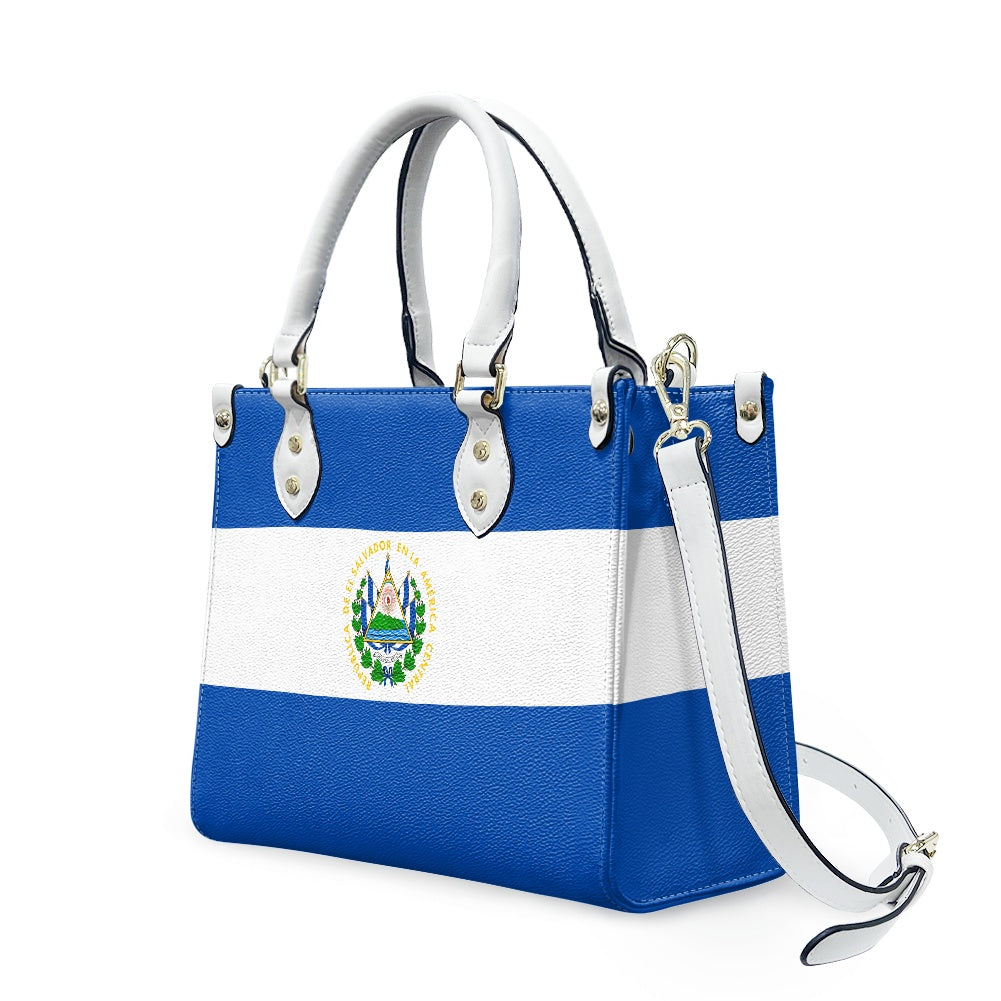 [Brand] handbag featuring El Salvador flag-inspired blue-white design.
