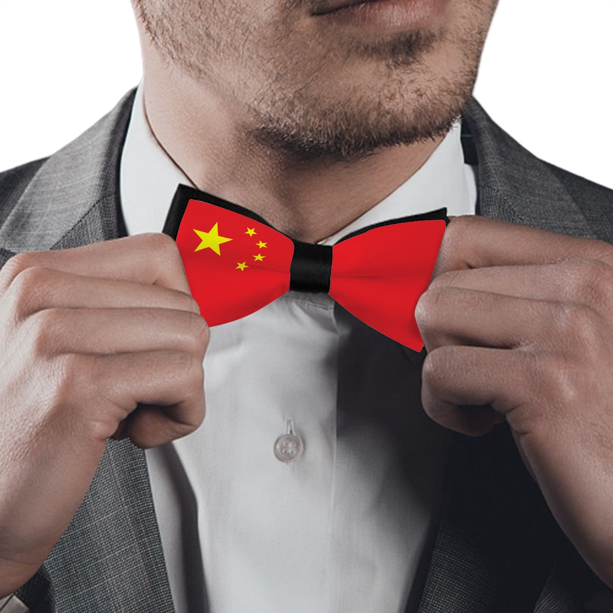 Man adjusting [Brand] bow tie with Chinese flag design.