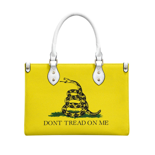 Yellow [Brand] handbag featuring snake and "Don't Tread" text.