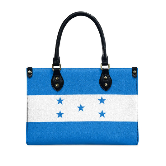 [Brand] handbag with Honduran flag design and black handles.