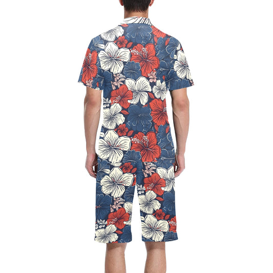 Person wearing colorful floral [Brand] outfit, viewed from behind.