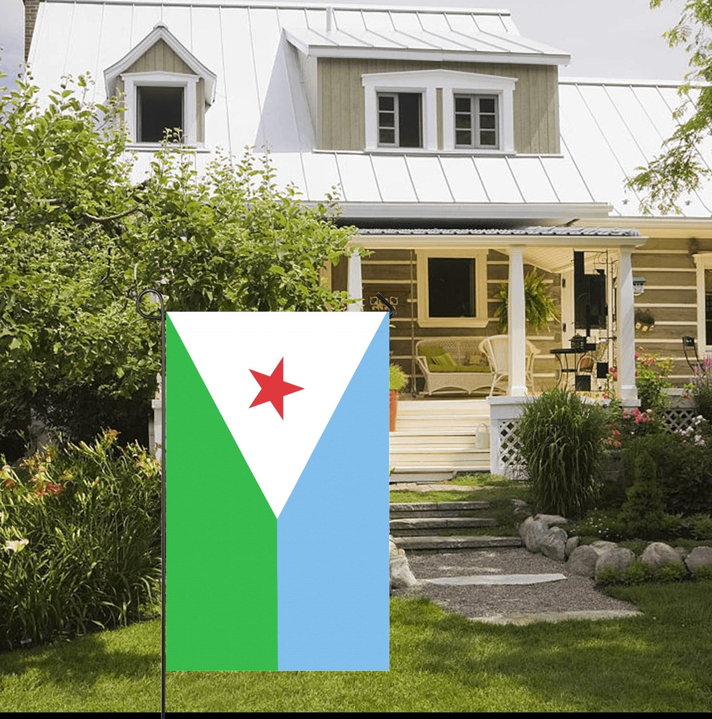 White cottage displaying [Luv My Flag] colorful garden flag.