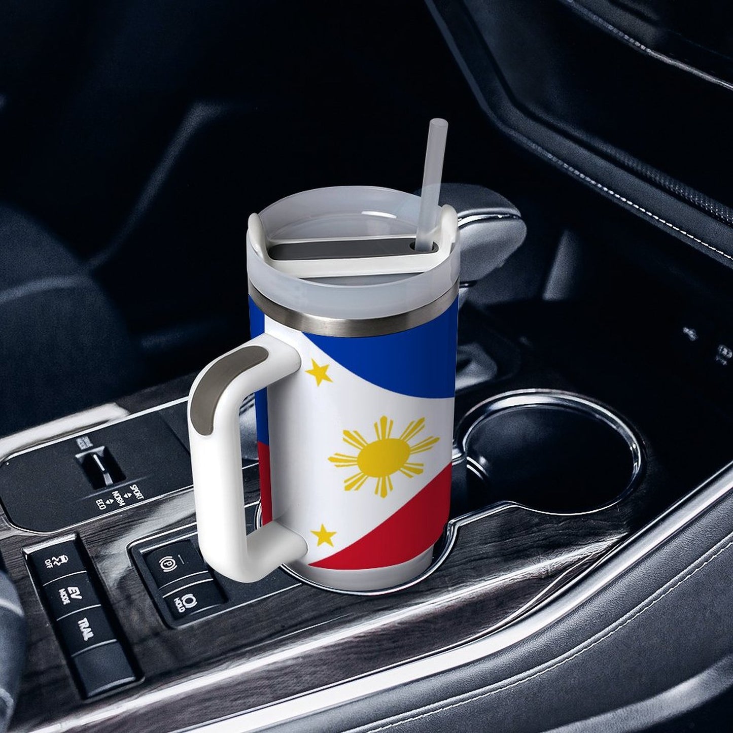 [Brand] travel mug with Philippine flag in car holder.
