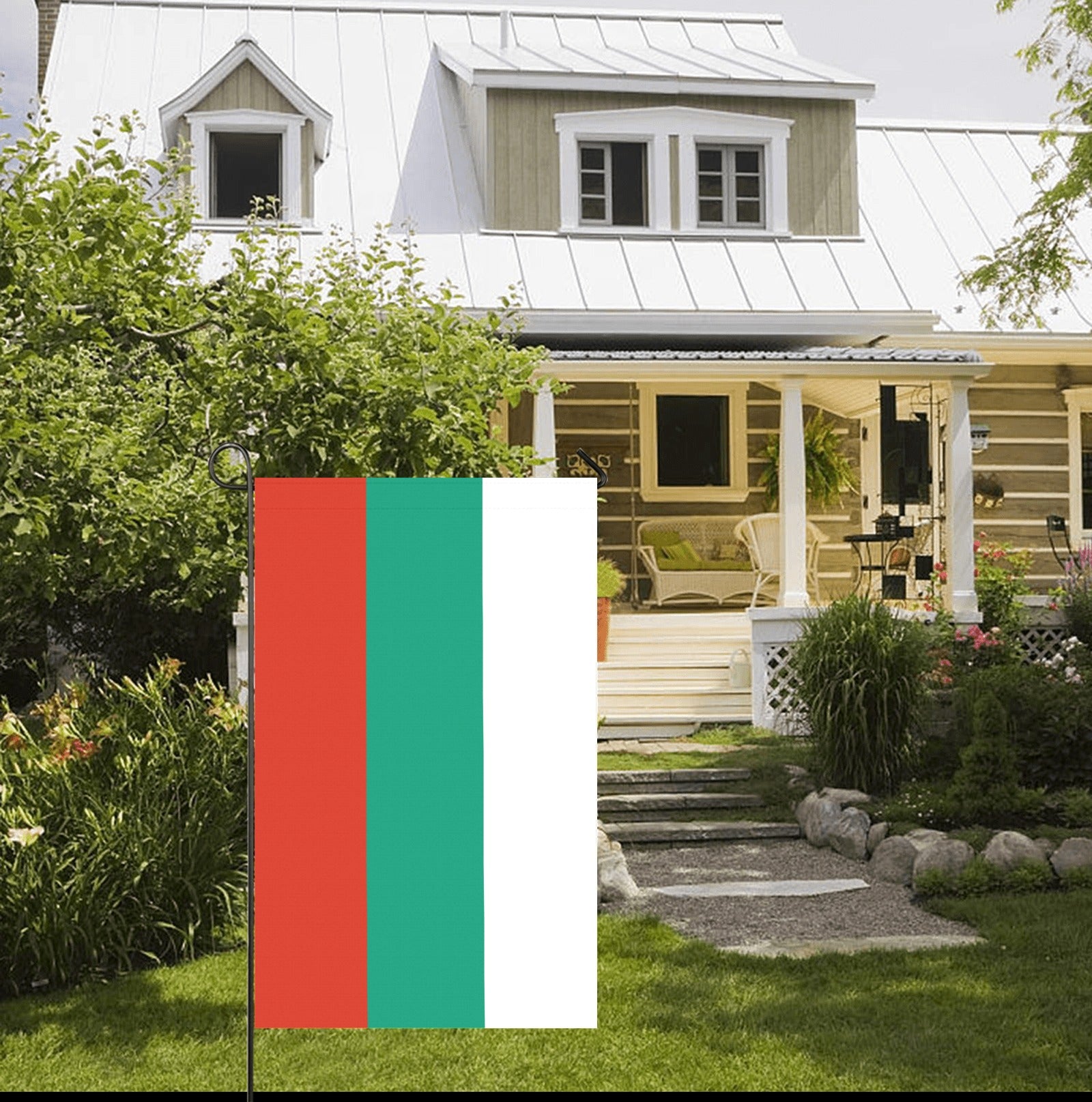 House with Luv My Flag garden flag displayed outside.