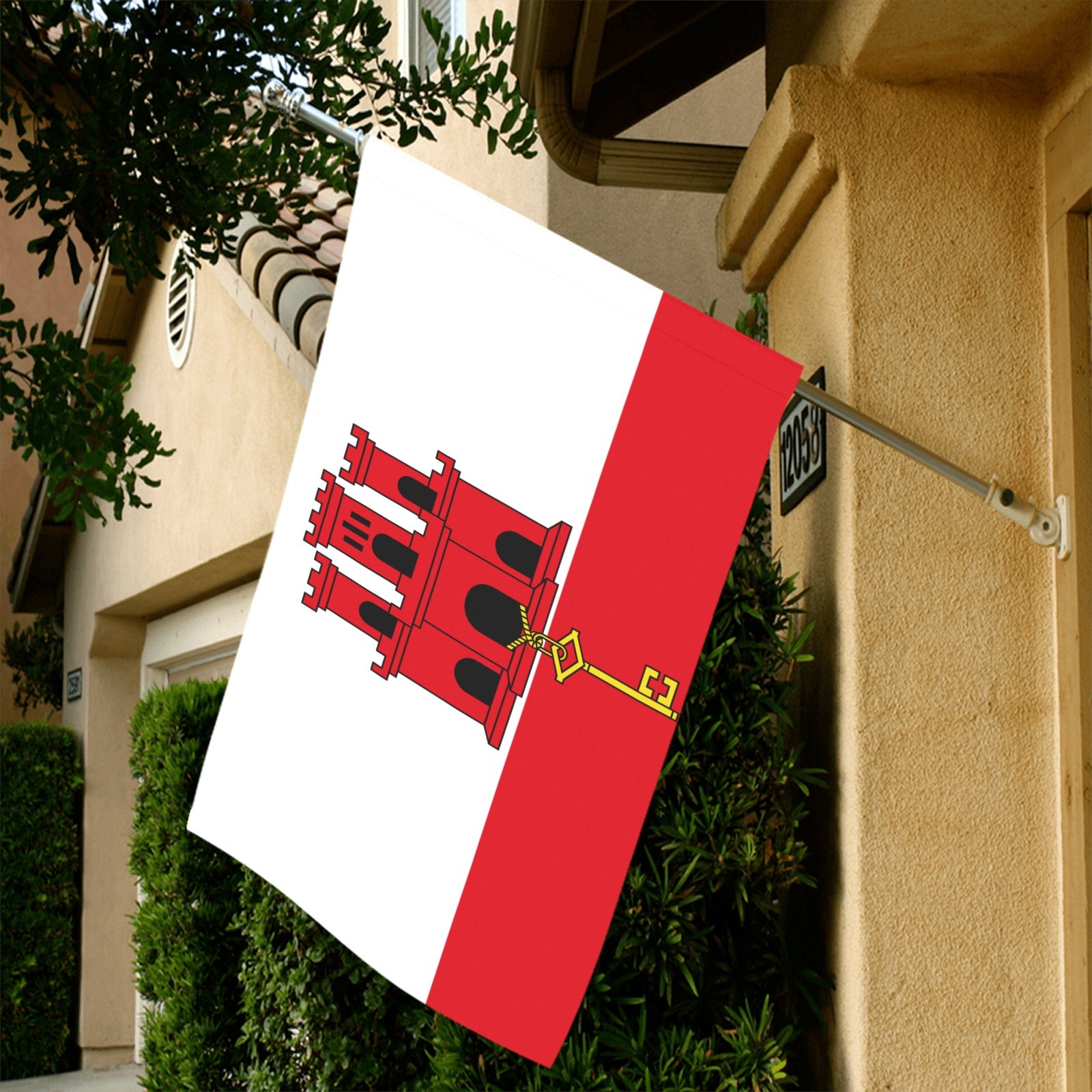 Flag of Gibraltar displayed outside house, by Luv My Flag.