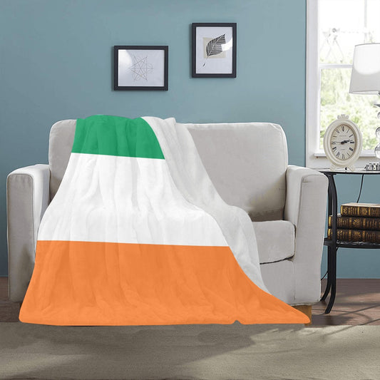 Cozy Irish flag blanket on sofa by Luv My Flag.