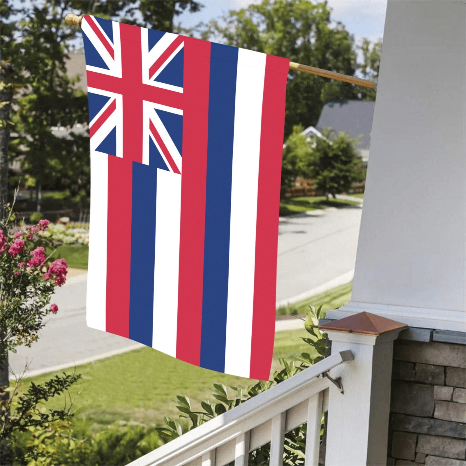 Hawaiian flag displayed on porch, residential neighborhood. Luv My Flag.