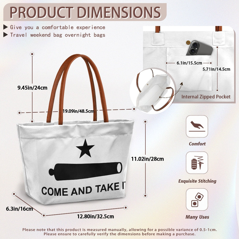 Canvas tote with leather handles by [Brand], dimensions detailed.