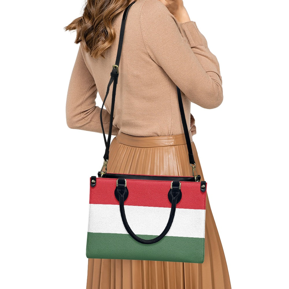 Woman wearing [Brand] handbag with tricolor design, casual outfit.