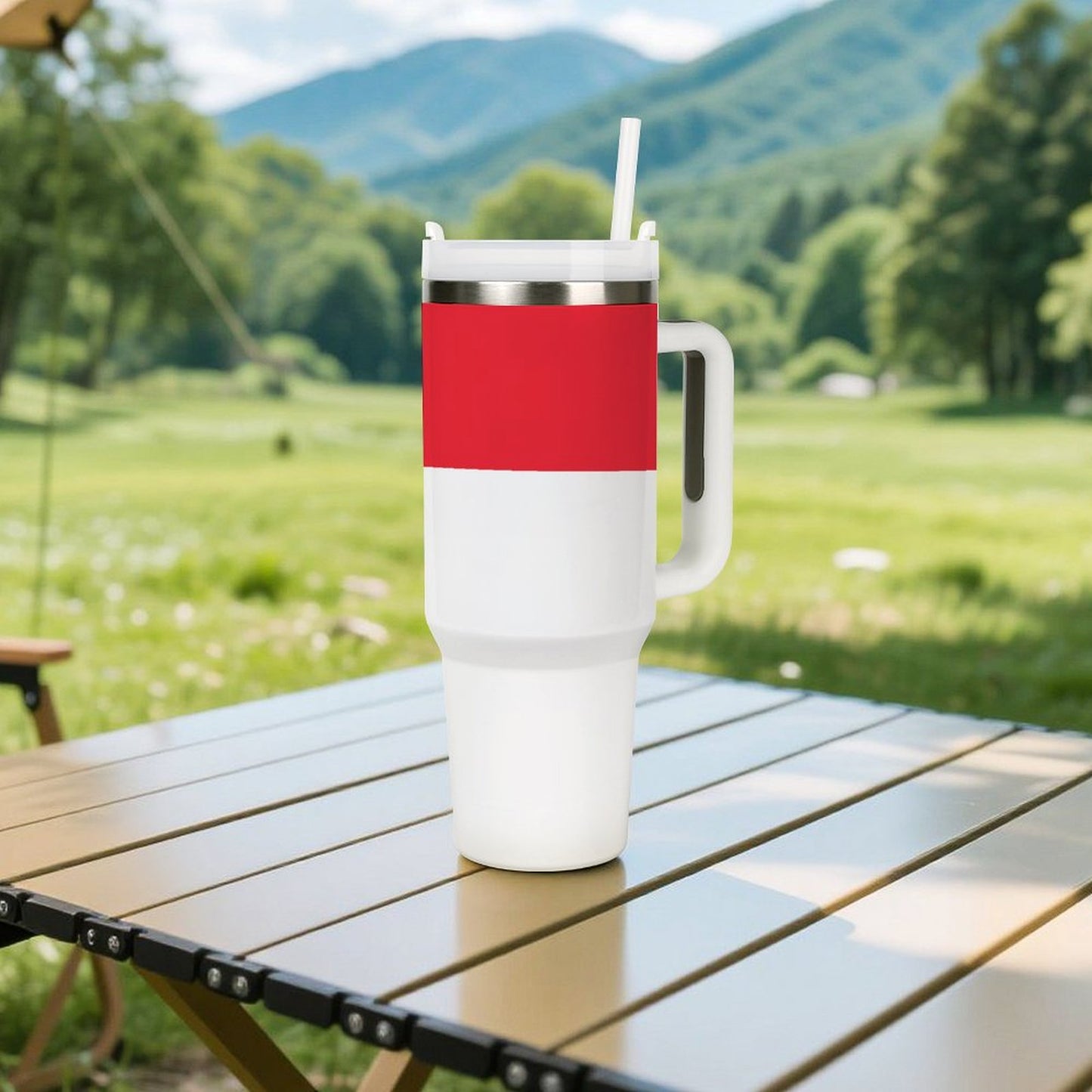 [Brand] tumbler with a straw on outdoor wooden table.