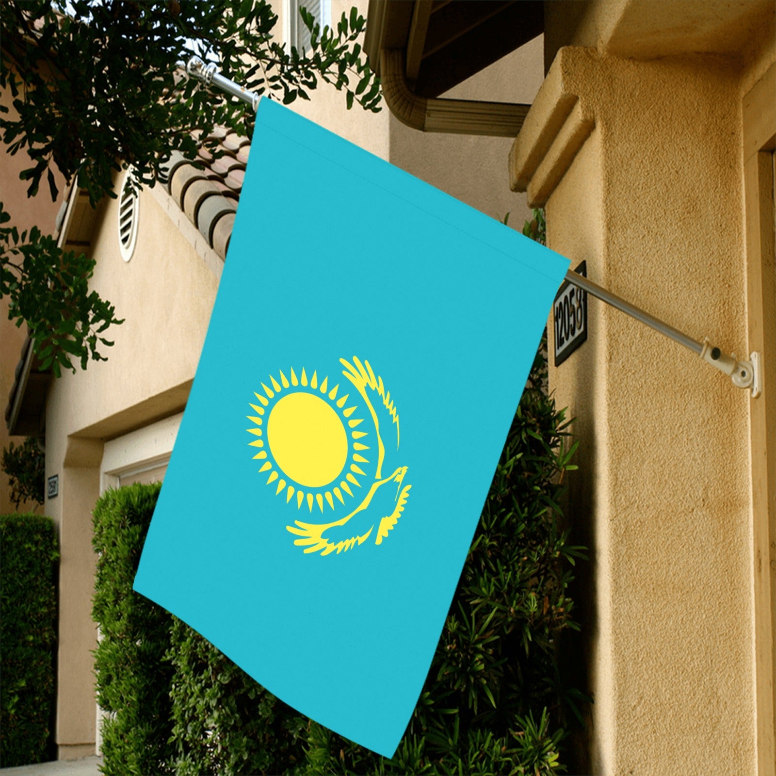 Kazakhstan flag by Luv My Flag displayed on house.