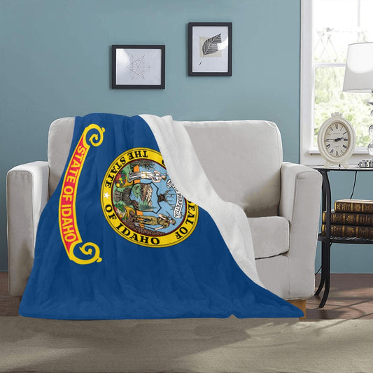 Cozy flag blanket draped on sofa, Luv My Flag.