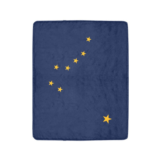 Navy blanket with yellow stars, representing Luv My Flag.