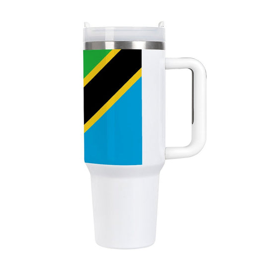 [Brand] white travel mug featuring vibrant Tanzania flag design.