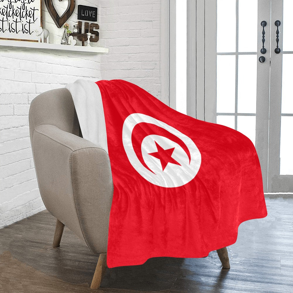 Cozy armchair with Luv My Flag Tunisian blanket.
