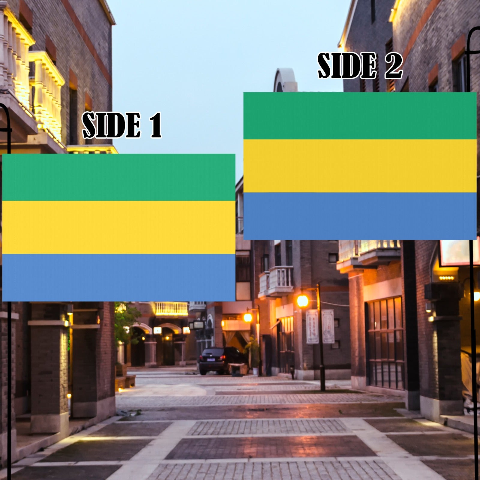 City street displaying [Luv My Flag] flags, evening lighting.
