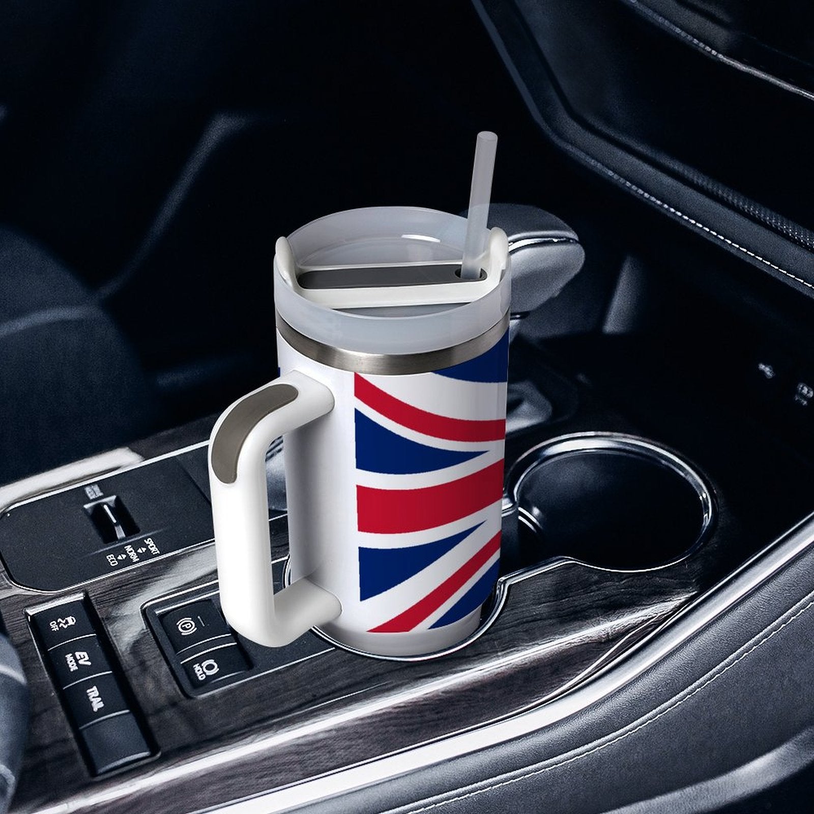 [Brand] mug with Union Jack design in car holder.