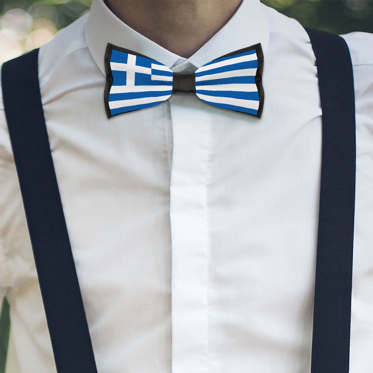 Person wearing [Brand] bow tie with Greek flag design.