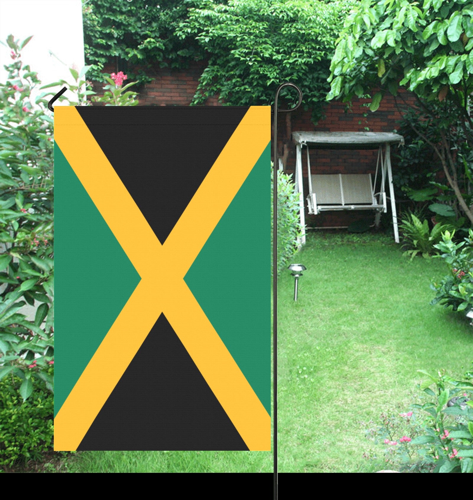 Luv My Flag garden flag in a lush backyard setting.