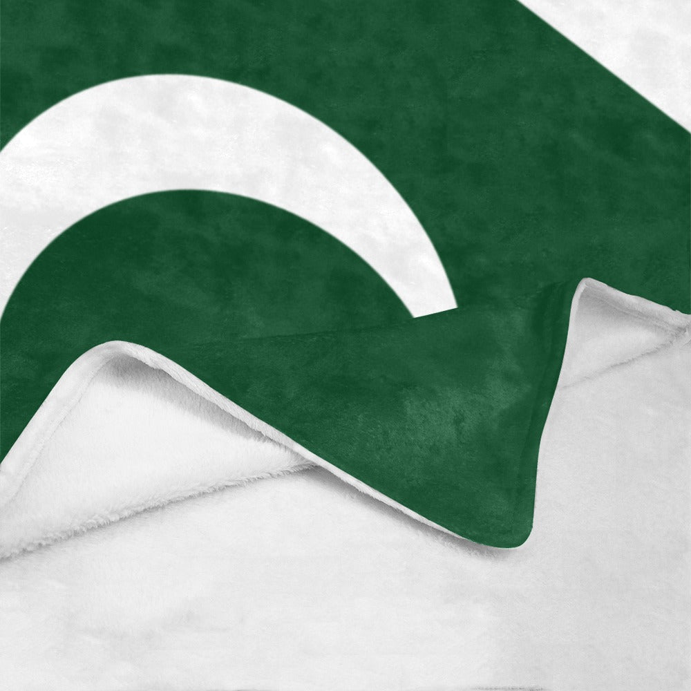 Green and white blanket, folded, from Luv My Flag.