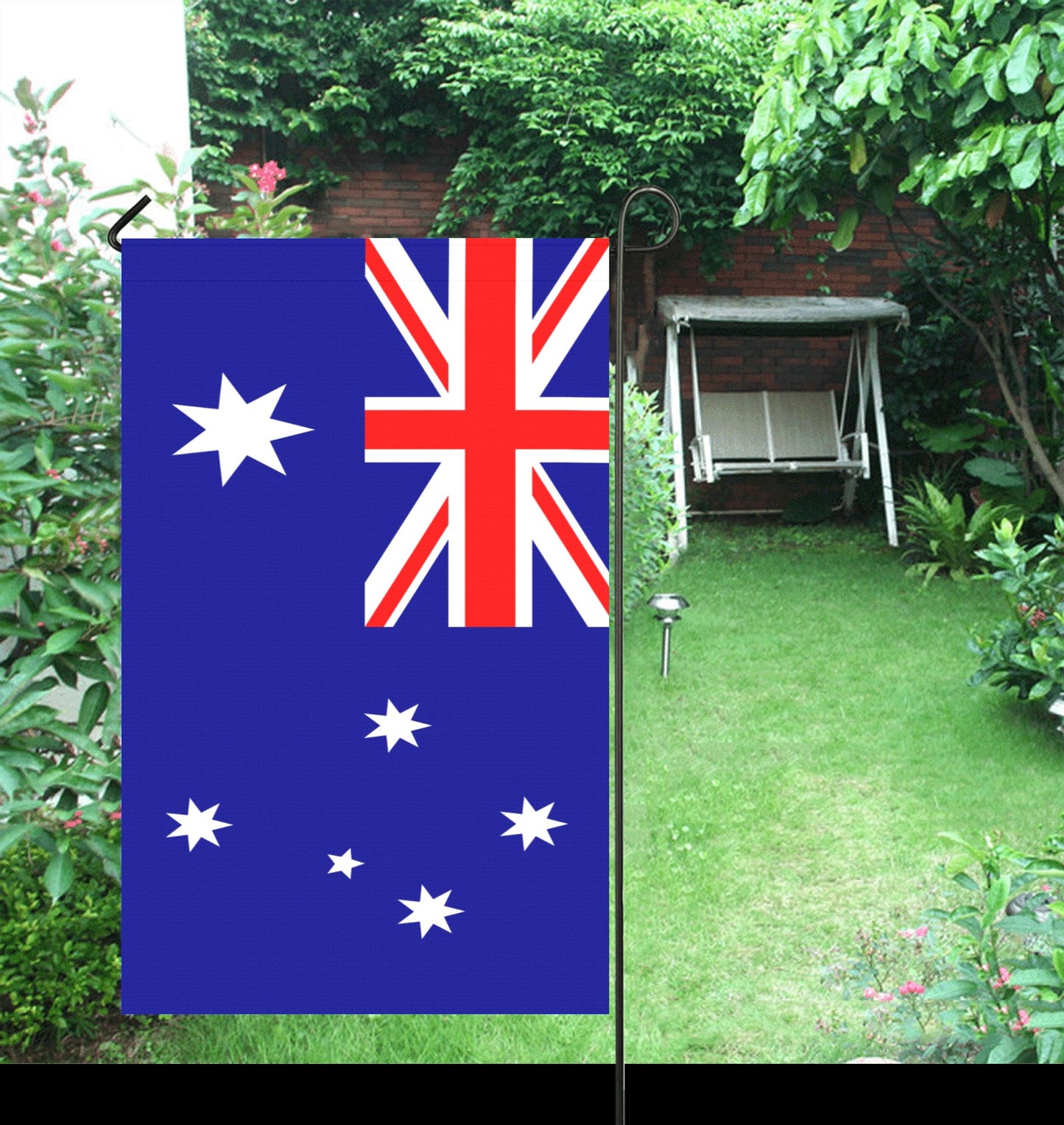 Luv My Flag garden flag with Australian design in yard.