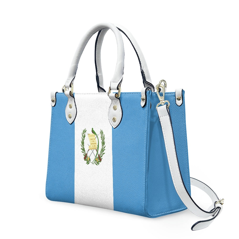 Blue handbag with [Brand] logo, featuring white vertical stripe.