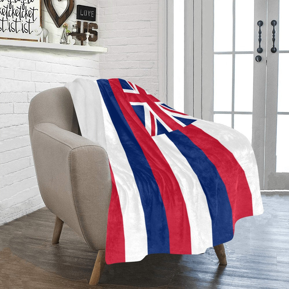 Cozy Luv My Flag blanket draped over beige chair.