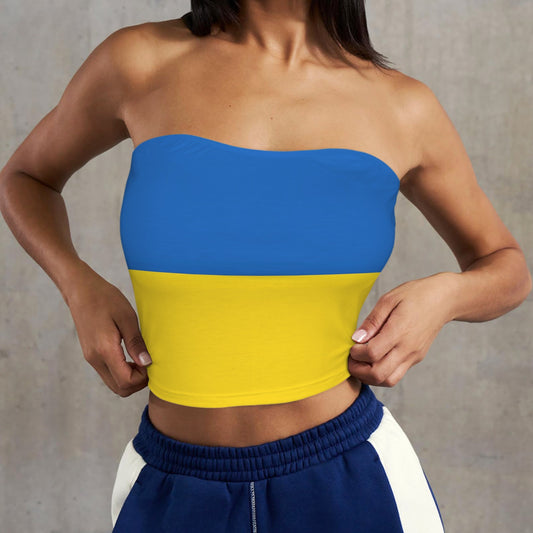 Woman wearing [Brand] Ukraine flag tube top, blue pants.